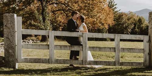 Fence Kiss Outdoor Wedding - Wild Trails Farm - Springfield, VT - Photo Credit Mountain Hearts Photography